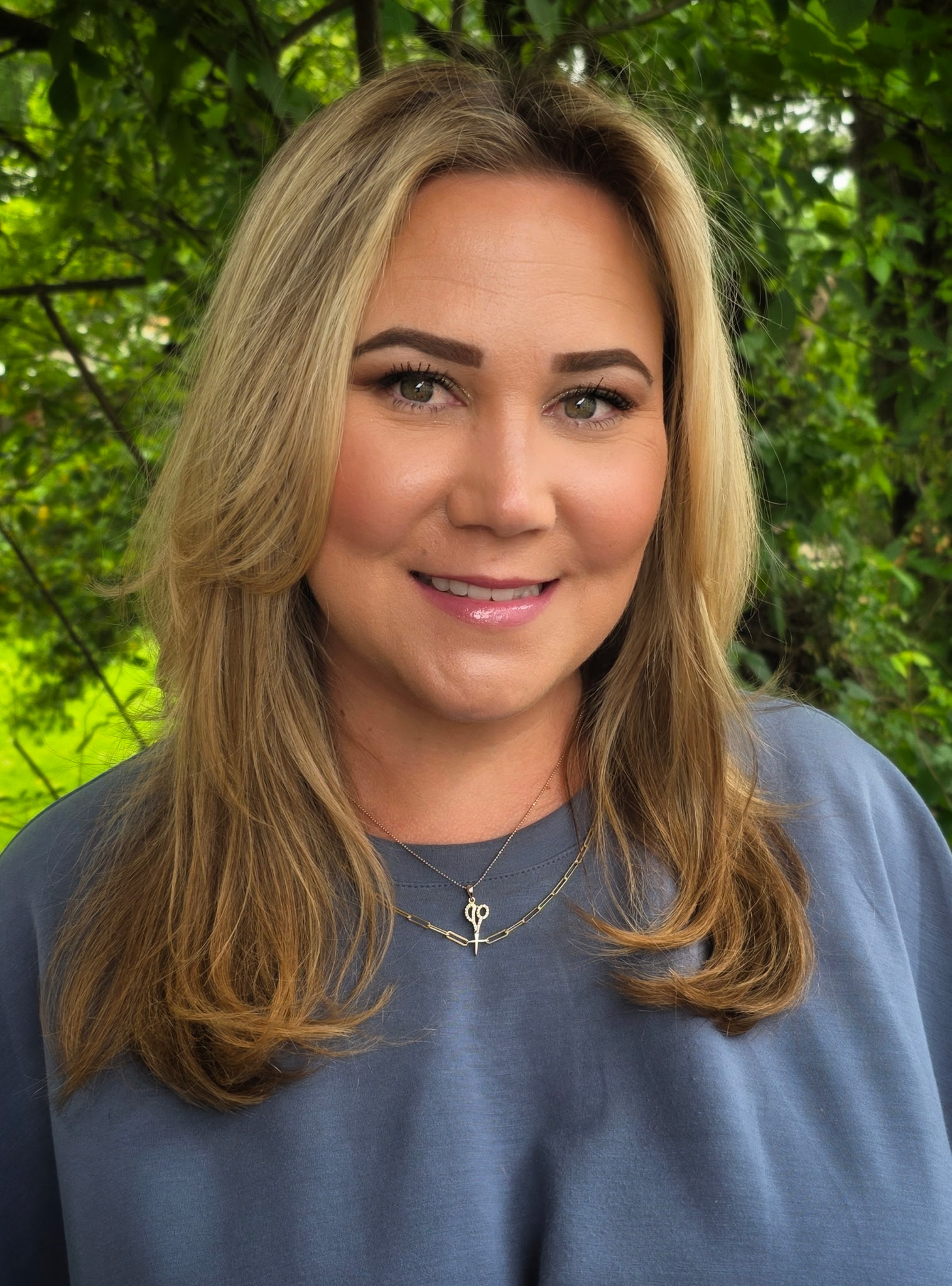 Smiling young woman with classic bob haircut